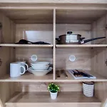 Comfort And Well Design Studio At Paltrow City Apartment By Travelio